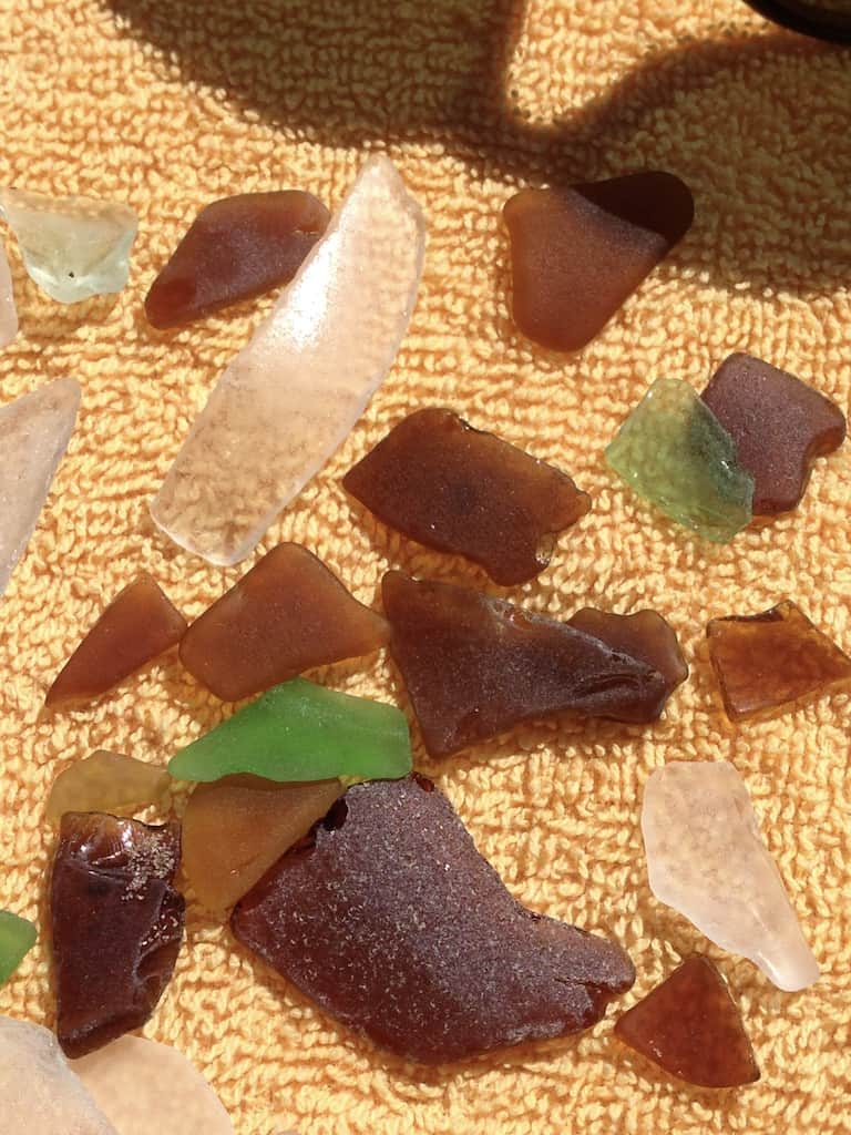 beachglass spread on an orange towel