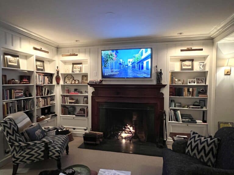 The Pros and Cons of Placing the TV Above the Fireplace.