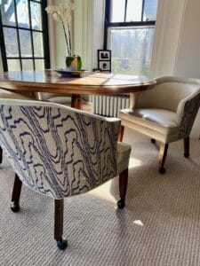 Blue and cream foix bois fabric on the game table chairs.