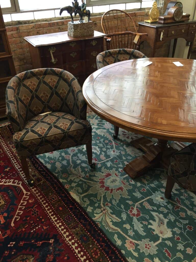 Photo of table and chairs taken at the auction house during the preview dates.