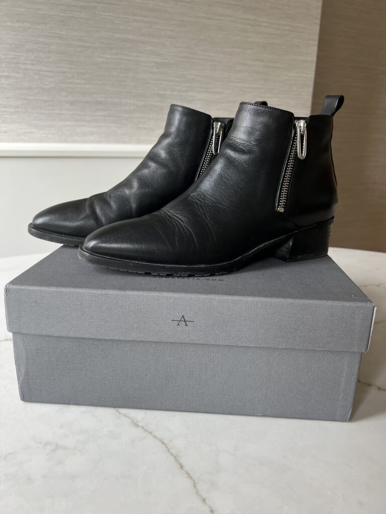 Photo of black Aquatalia ankle boots.
