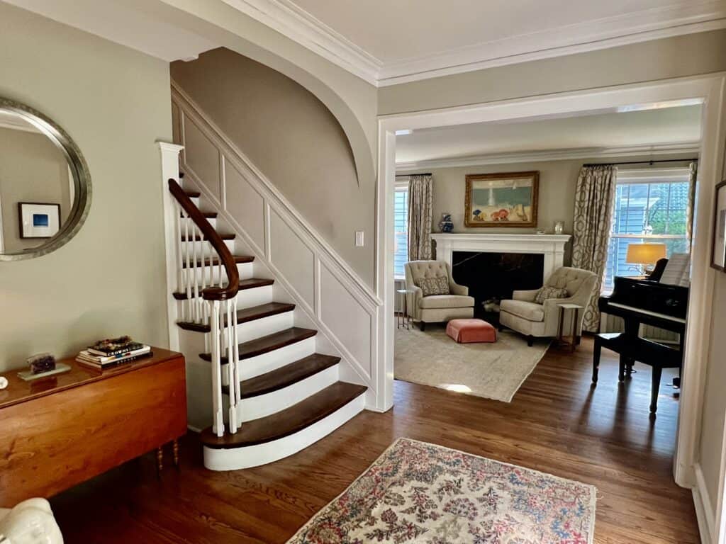 View of the foyer and the living room with the same paint color as the foundation for my interior design flow.