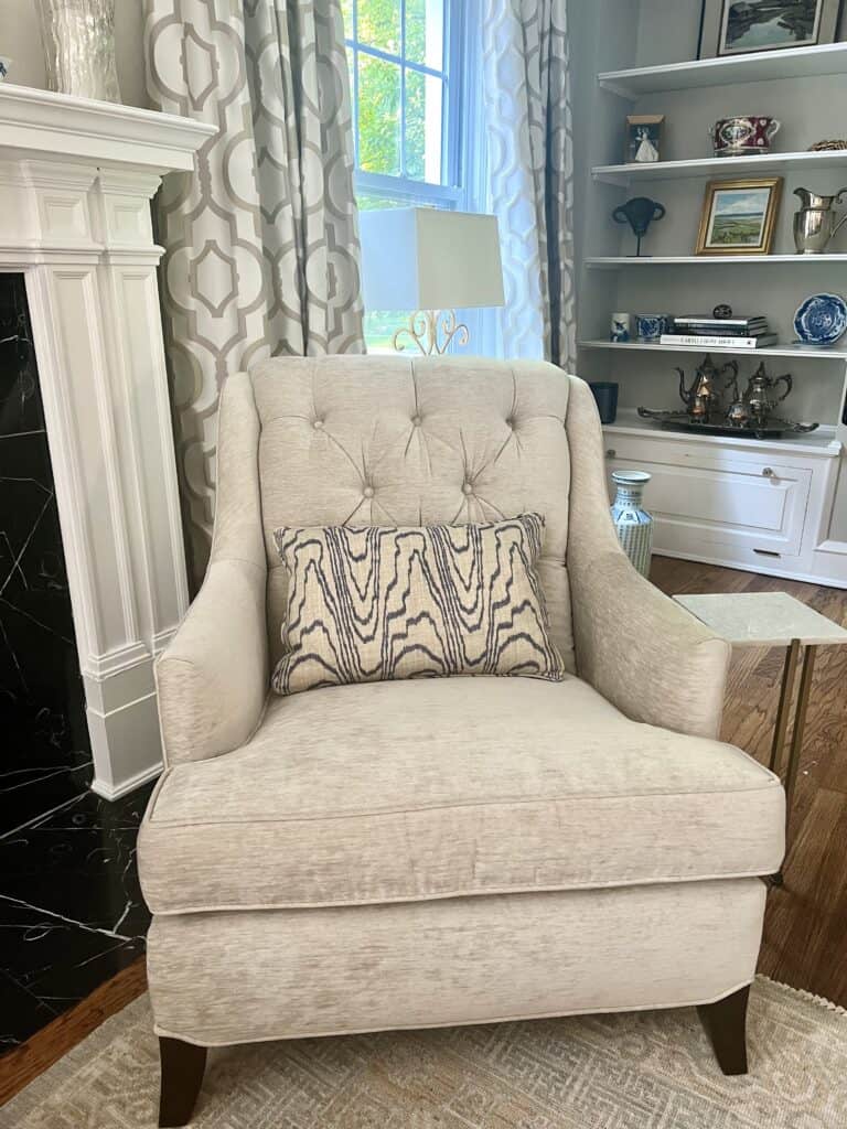 Pillows were made out of the game table chair material to foster a sense of flow from the family room to the living room. 