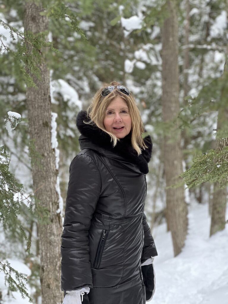 Photo of a woman staying warm in style in a Mackage coat, 