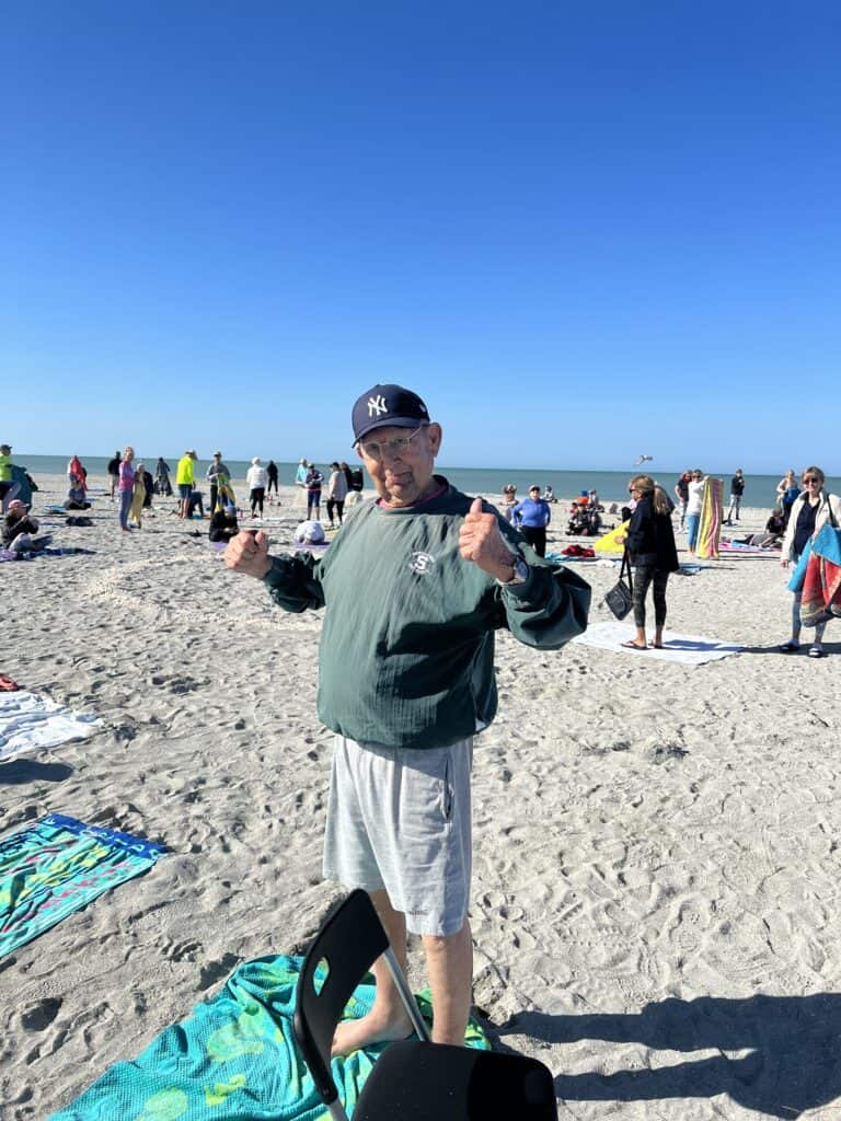 Dad, on the beach in Venice, Florida 
having completed beach yoga with me.