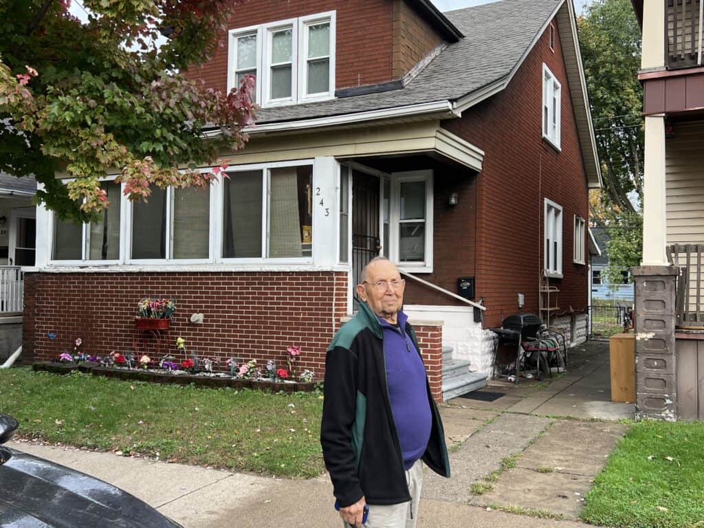 My Dad standing in front of the house he was born in. 